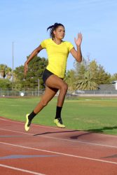 Female,Athlete,Running,On,Runing,Track